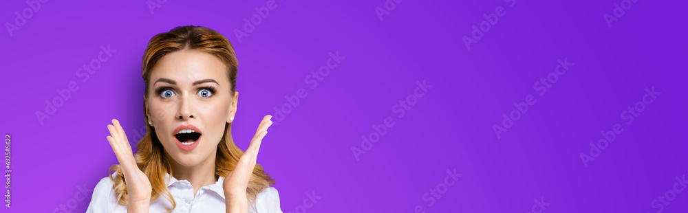Wow. Face portrait image excited surprised, shocked happy business woman wide open mouth and eyes raised up hands. Unbelievable sales offers, incredible, win shock expression concept. Purple color. Wow. Face portrait image excited surprised, shocked happy business woman wide open mouth and eyes raised up hands. Unbelievable sales offers, incredible, win shock expression concept. Purple color.