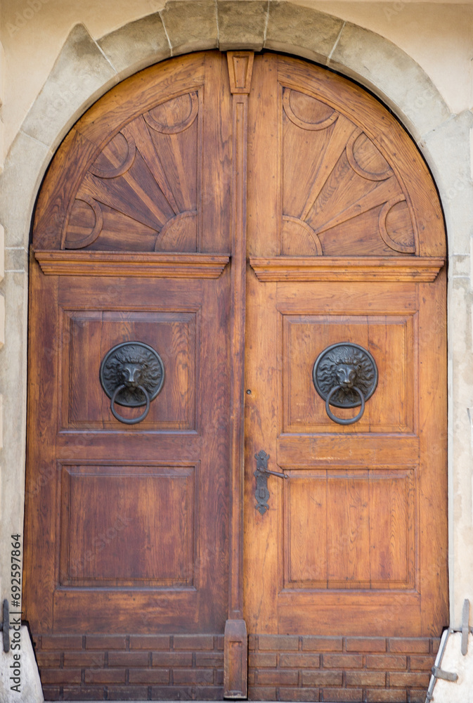 Old vintage wooden brown door close-up