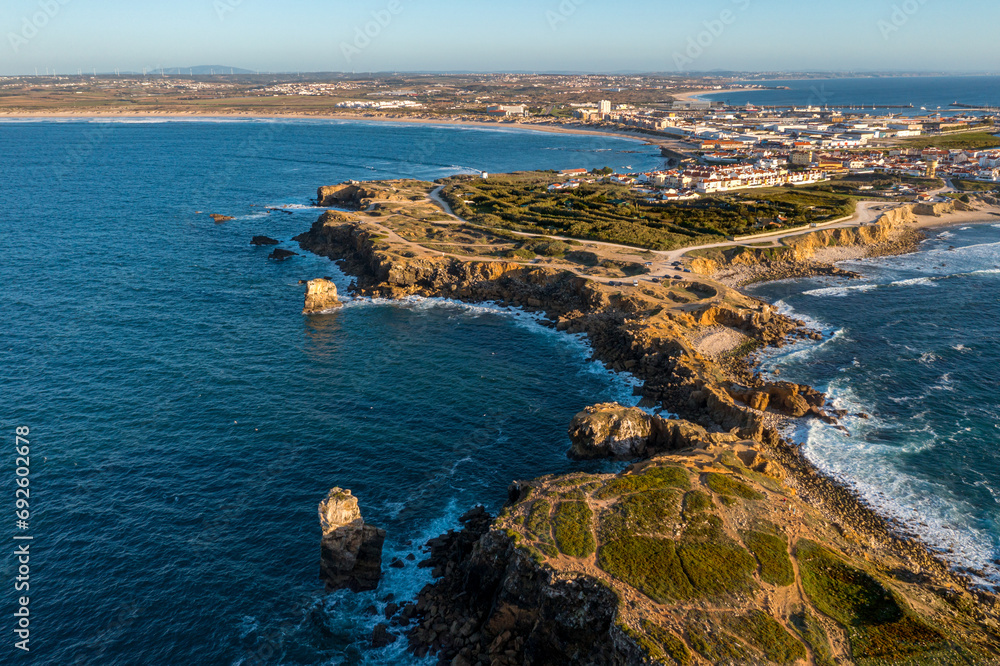 Aerial image of peninsula and town of Peniche, Portugal on sunny day