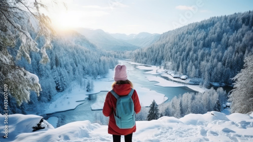 Back view of pre-teen girl enjoying breathtaking view of winter landscape. Generative Ai. photo