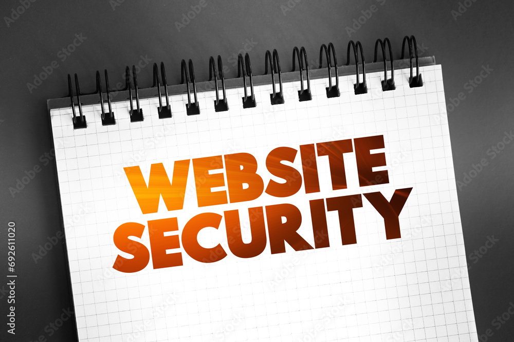 Fototapeta premium Website Security text on notepad, concept background