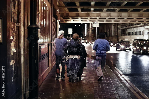 punks fashion men on the street night in London 2000