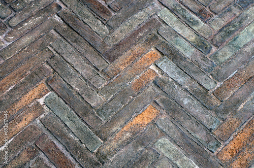 Vintage brown block pavior driveway. Seamless texture of street tiles. Pattern of brown sidewalk tiles. Paved path pattern, brick path road. Cobblestone textured detailed ground concrete pavement