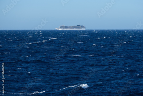 Huge modern cruiseship or cruise ship liner Magnific at sea in summer during Mediterranean cruising dream vacation photo