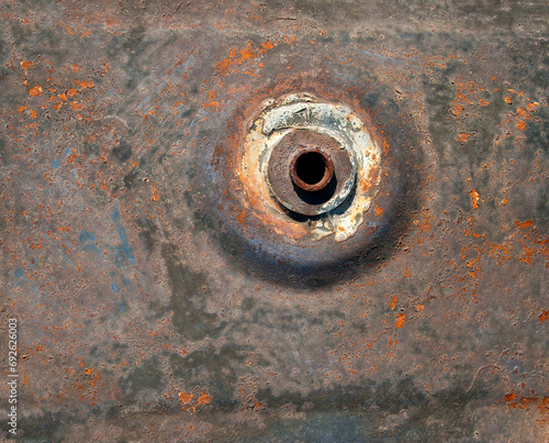 Unpainted metal texture with orifice