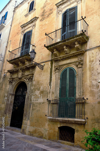 details of ancient buildings in baroque style in the historic center of Lecce Italy © maudanros