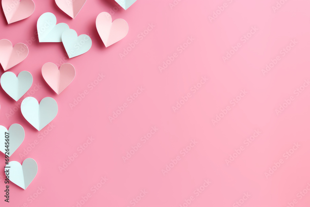 Paper hearts for Valentines Day on pink background, copy space