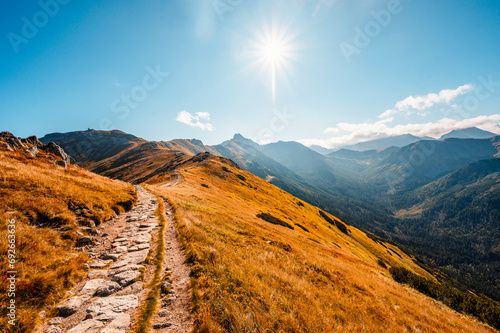 Mountain Tatras landscape. View from ridge of the Poland Tatras. Hiking from Kasprowy Wierch peak to Gievont peak . View on zakopane and Ticha valley. photo