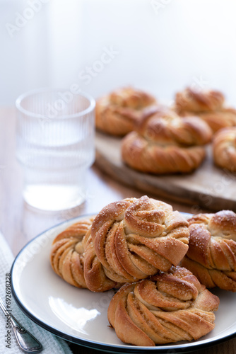 Traditional Swedish cardamom buns kardemummabullar made of yeast dough