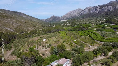 Drone footage over the Gallinera valley, near Pego in the north of Alicante, Spain. Agricultural area and known for its hiking trails