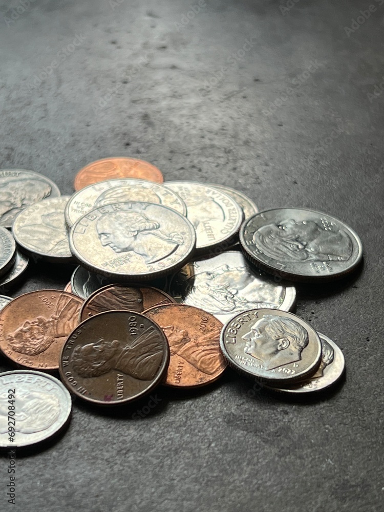American money, coins, quarters, dimes, nickels, pennies, close up, banking and finance American money, coins, quarters, dimes, nickels, pennies, close up, banking and finance