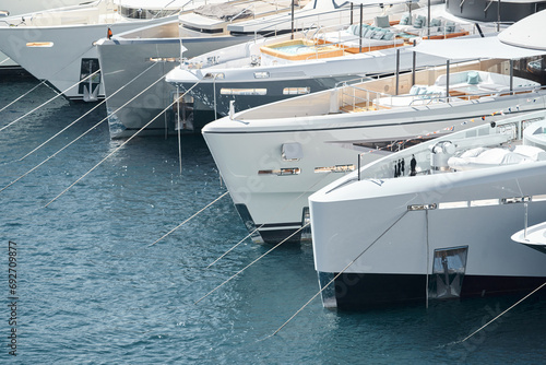 Few huge luxury yachts at the famous motorboat exhibition in the principality of Monaco, Monte Carlo, the most expensive boats for the richest people