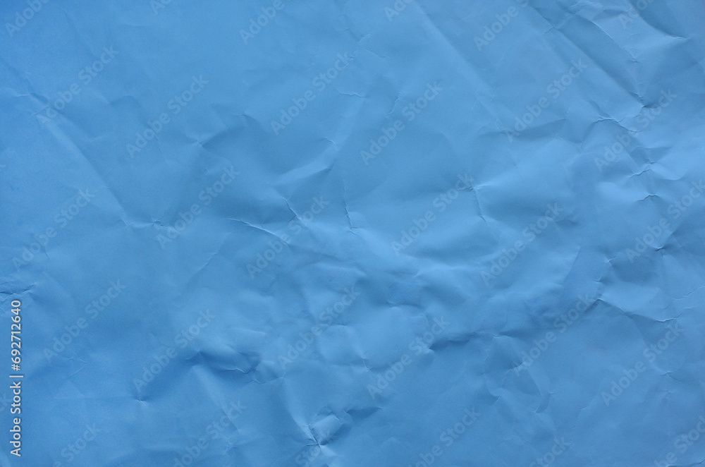 Blue crumpled paper for background image