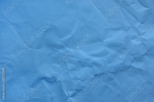 Blue crumpled paper for background image