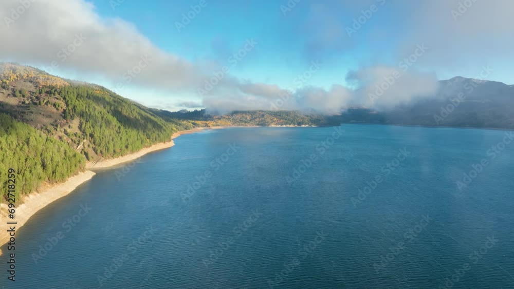 Aerial of low clouds above the Palisades Reservoir on the Snake River in Idaho. Aerial of low clouds above the Palisades Reservoir on the Snake River in Idaho.