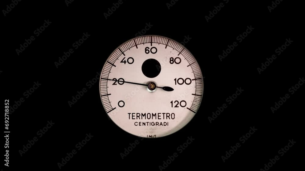 Old pointer thermometer from 13 to 28 degrees, moving, black background Old pointer thermometer from 13 to 28 degrees, moving, black background