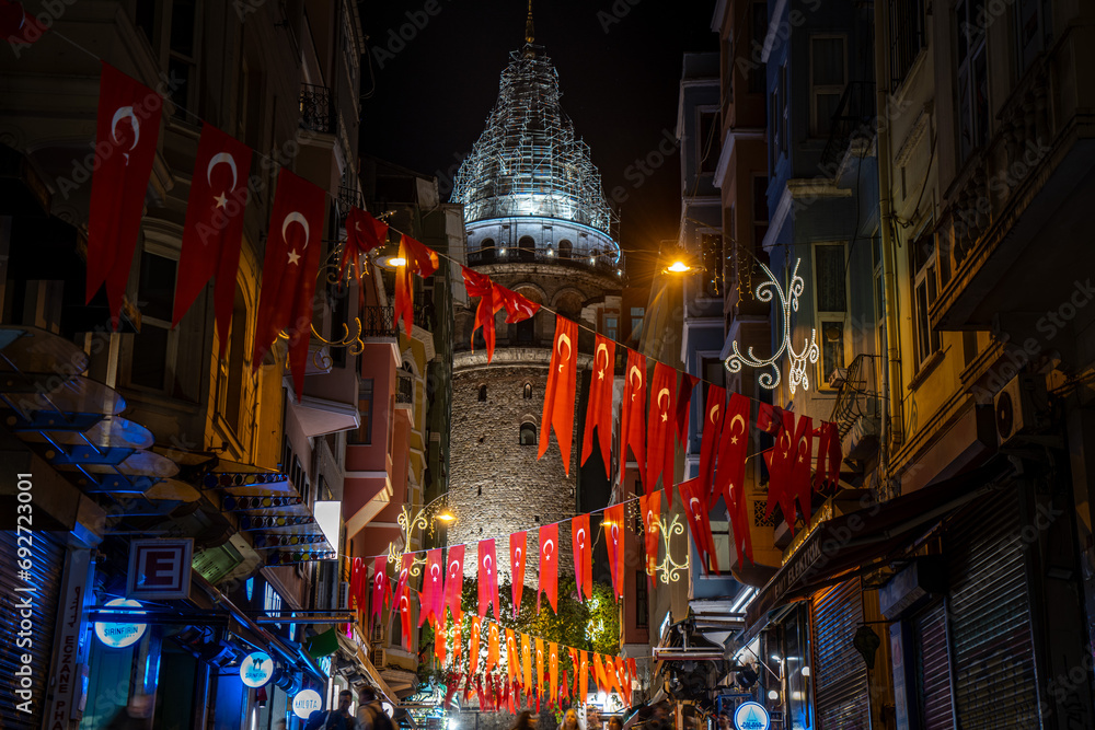 galata tower istanbul with turkey flags - obrazy, fototapety, plakaty 