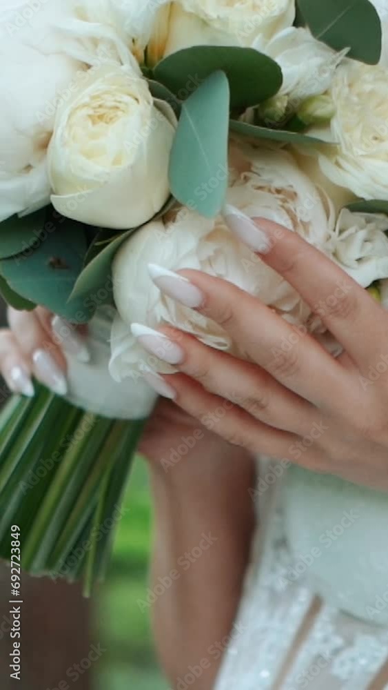 beautiful wedding bouquet of the bride of white roses and green eucalyptus close-up, romantic atmosphere before the outdoor ceremony, floristry and decoration beautiful wedding bouquet of the bride of white roses and green eucalyptus close-up, romantic atmosphere before the outdoor ceremony, floristry and decoration
