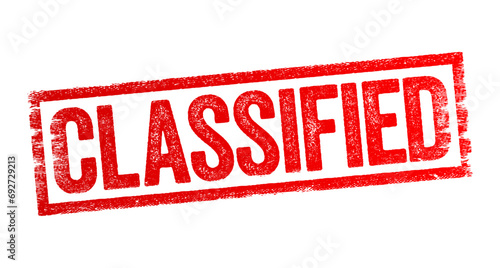 Classified - designated as officially secret and accessible only to authorized people or arranged in classes or categories, text stamp concept background photo