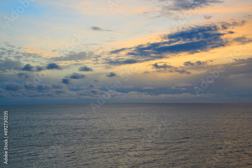 cloudy sunset over the sea for sky replacement purposes
