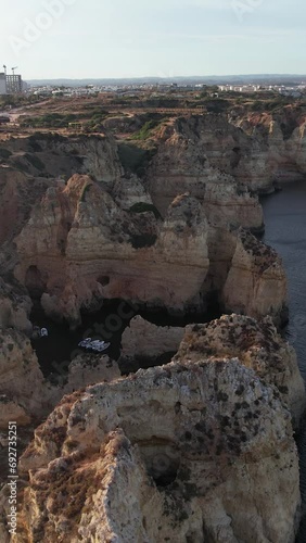 Vertical Video of Sea Rocks Formations in Cova da Piedade, Lagos, Portugal.  photo