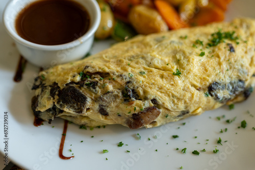 Tableau sur toile Vegetarian lunch dish in old bistro in Limoges, France,  eggs omelette with fore