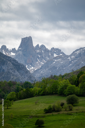 Panoramic view on Naranjo de Bulnes or Picu Urriellu  limestone peak dating from Paleozoic Era  located in Macizo Central region of Picos de Europa  mountain range in Asturias  North Spain