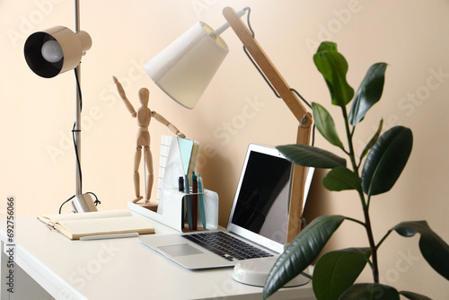 Stylish workplace with mode...