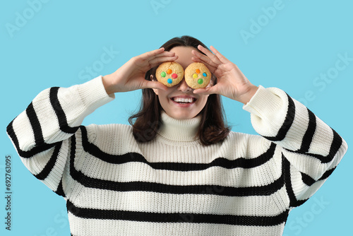 Playful young woman holding...