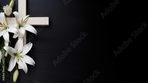 Christianity wooden cross with white lilies on a black background with copy space. Holy easter #692765487