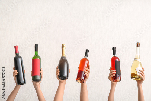 Female hands with bottles o...