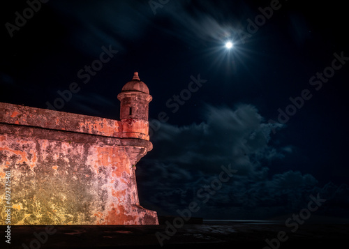 Fort San Felipe de El Morro in San Juan, Puerto Rico with full moon photo