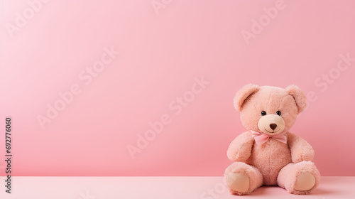 teddy bear with ribbon on a pink background, Girl's Day, Valentine's Day concept with product placement space