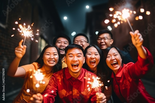 Group of young chinese people celebrating in red traditional costumes a new year of green dragon 2024