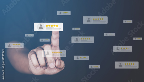 Customer review good rating concept, hand pressing user and five star icon on visual screen for positive customer feedback, testimonial and testimony, photo