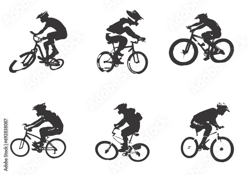 Silhouette of boys riding a bmx bicycle