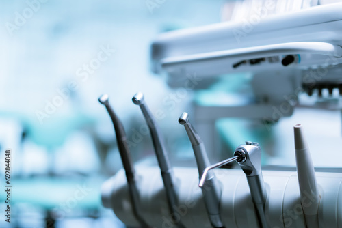Different dental instruments and tools in a dentists office photo