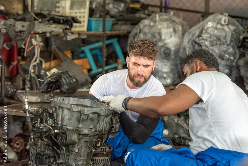 auto two professional mechanical technician garage motor car engine team check automobile engine for diagnostic maintain transmission machine. technician worker auto in garage check engine car motor auto two professional mechanical technician garage motor car engine team check automobile engine for diagnostic maintain transmission machine. technician worker auto in garage check engine car motor