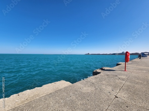 person walking on the pier