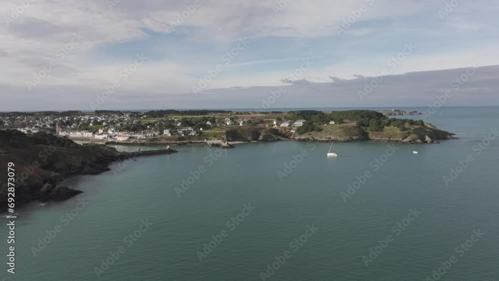 Approaching Sauzon port on the island of Belle in the French Atlantic coast Brittany, Aerial approach shot Approaching Sauzon port on the island of Belle in the French Atlantic coast Brittany, Aerial approach shot