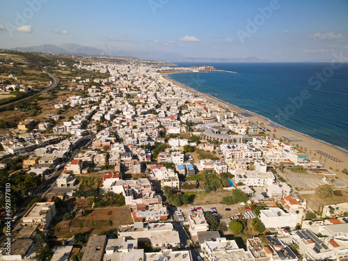 Aerial view of Rethymno in Crete, Greece, touristic area, beach hotels and rental homes, beautiful long beach