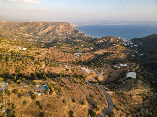 Crete, Greek island aerial landscape of Agia Galini fishing village resort and hills