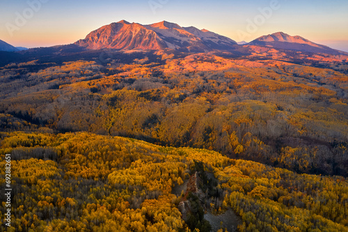 an aerial photo with two mountains in the distance and trees in the foreground, Kebler Pass, Colorad photo