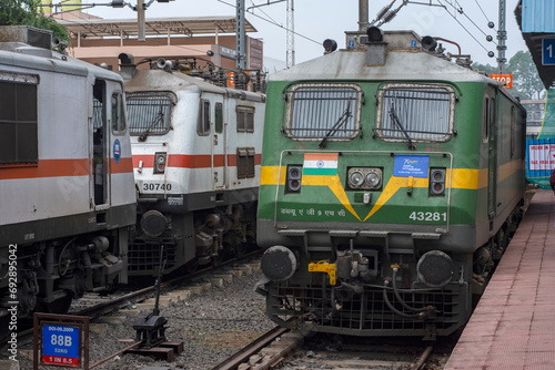 3rd December, 2023, Singapore Road, Orisa, India: An Indian railway train engine crossing a platform.