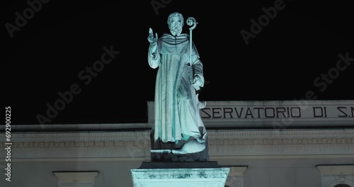 Saint Antonino Statue in Sorrento's Piazza at night, Italy photo