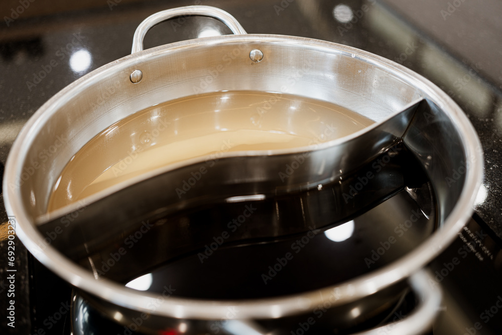 Close up shabu pot. Japan food hotpot two styles of shabu soup two in one soup in shabu pot. Close up shabu pot. Japan food hotpot two styles of shabu soup two in one soup in shabu pot.