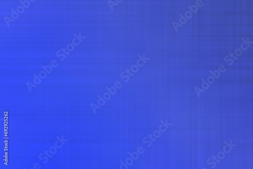 淡くぼやけた格子状の縞模様が入った紺色の背景テクスチャー画像 photo