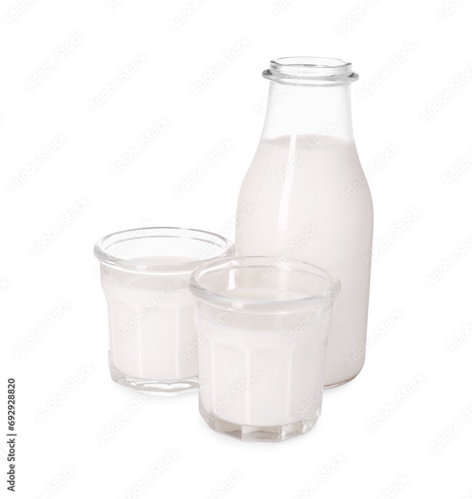 Glassware with tasty milk isolated on white Glassware with tasty milk isolated on white
