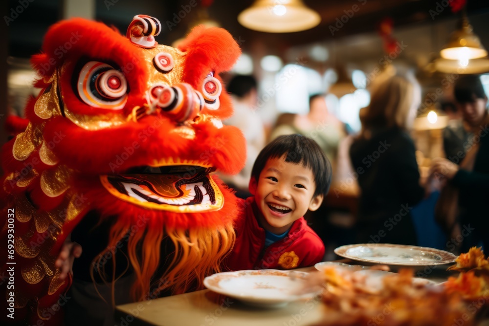 Asian boy in a restaurant with a Chinese red dragon