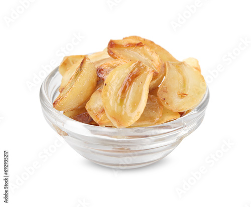 Fried garlic cloves in bowl isolated on white